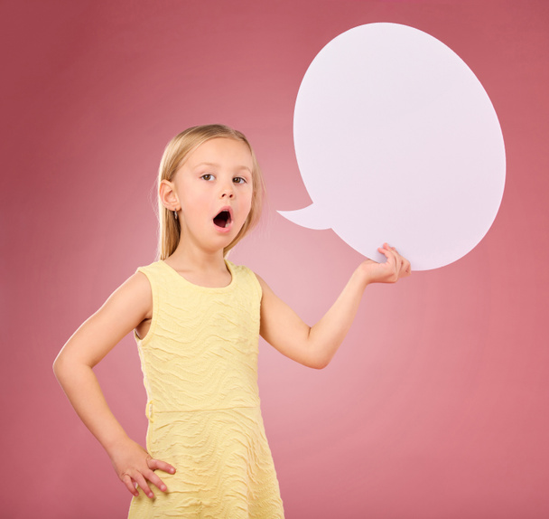 Speech bubble, talking and portrait of child on pink background for news, announcement and opinion. Speaking, communication and girl with open mouth and poster, banner and billboard space in studio. - Photo, image