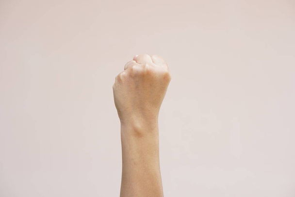 Asian woman clenching her fist - Photo, Image