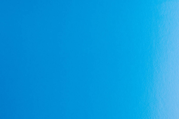 Fundo azul com textura de papelão e gradiente. Antecedentes para design e publicidade. - Foto, Imagem