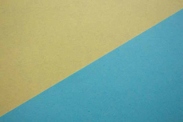 Κίτρινο και μπλε φόντο υφή χαρτιού. Κενή επιφάνεια χαρτιού για σχέδια. - Φωτογραφία, εικόνα