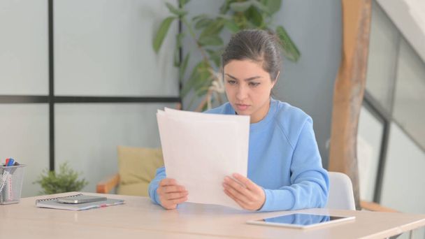 Indian Woman Reading Documents in Office, Paperwork - Photo, Image