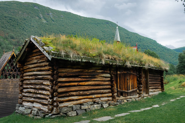 Old wooden barn with grass roof in Borgund, Norway - Fotoğraf, Görsel
