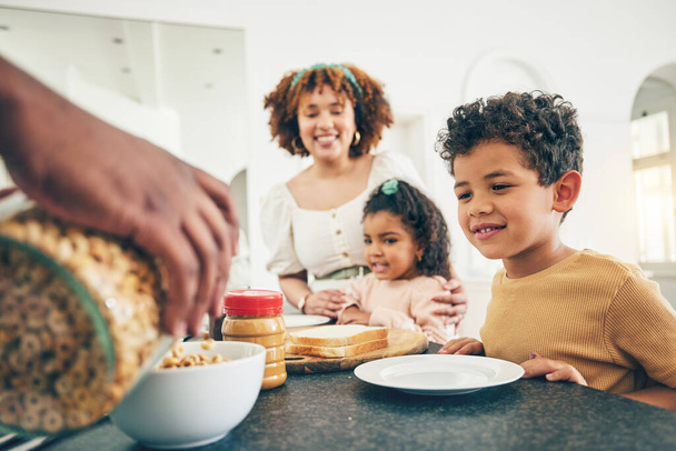 Love, breakfast cereal and happy black family children, mother and father eating meal, bonding and prepare ingredients. Morning food, hands and hungry mom, dad and young youth kids in home kitchen. - Foto, afbeelding