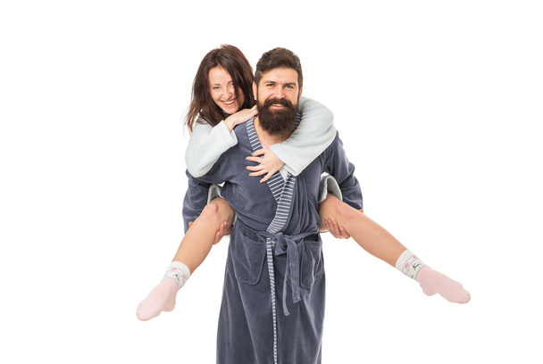 I am happy with you. Happy woman ride piggyback on man. Family romance. Playful couple in love. Making fun. Romantic morning. - Valokuva, kuva