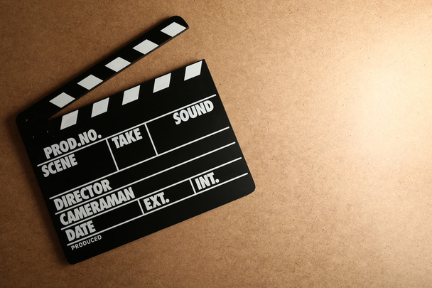 Movie clapper on wooden background - Photo, Image