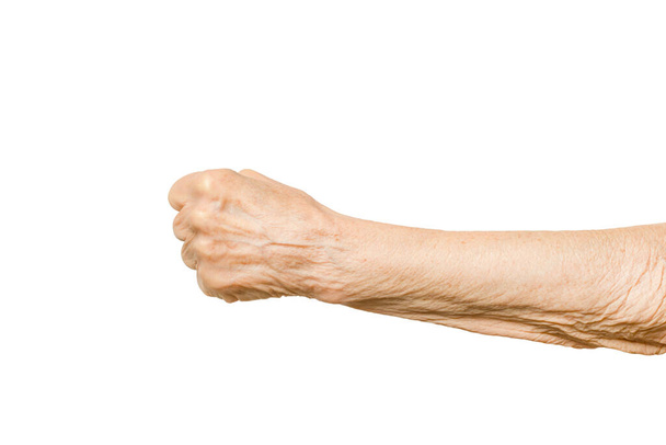 Old lady arm. Elderly woman fist isolated on white background. - Photo, Image
