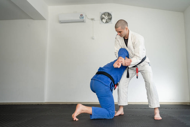 Βραζιλιάνικο jiu jitsu bjj concept training πολεμικές τέχνες καταπολέμηση του αθλητισμού - Φωτογραφία, εικόνα