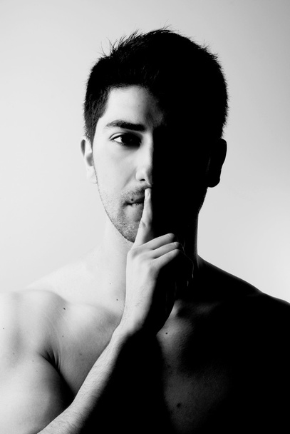 Sexy man in silence gesture - Foto, Imagem