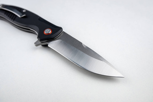 Tactical combat knife isolatred on white background. Sharp survival knife - Photo, Image