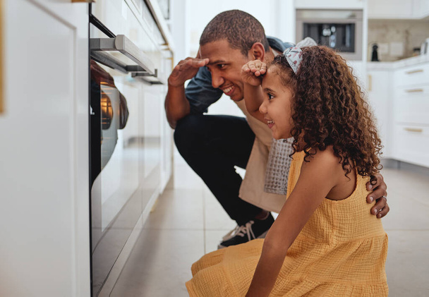 Father, girl and kitchen by oven, baking and learning together for love, bonding or happiness in family home. Dad, female child and happy black family for smile, stove and cooking at house in Chicago. - Photo, Image