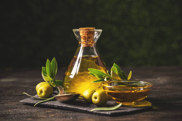 Healthy food concept with extra virgin olive oil, still life - Foto, Bild