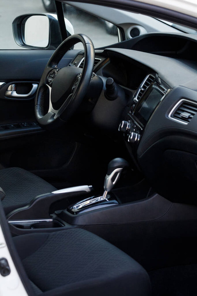 Modern car interior. Front passenger seat view - Fotó, kép
