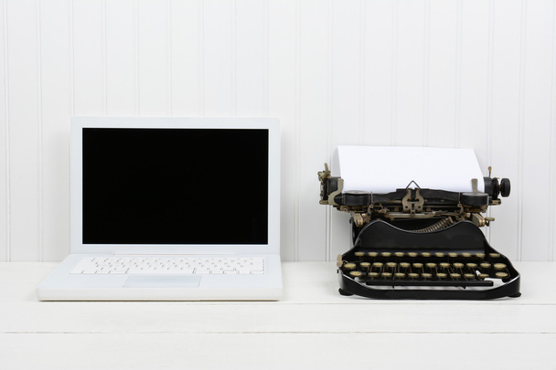 Modern Laptop and Antique Typewriter - 写真・画像