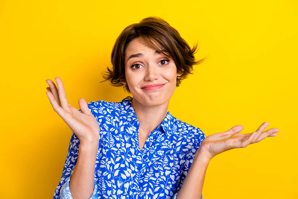 Photo of pretty cute lovely lady wear blue clothes showing two hands gesture no answer isolated on yellow color background. - Фото, зображення
