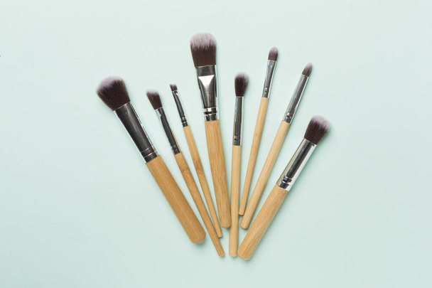 Make up brush on color background, top view - Fotografie, Obrázek