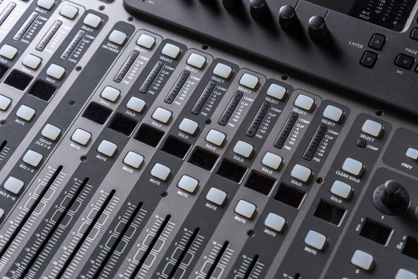 closeup view of professional audio digital mixing sound console - Photo, image