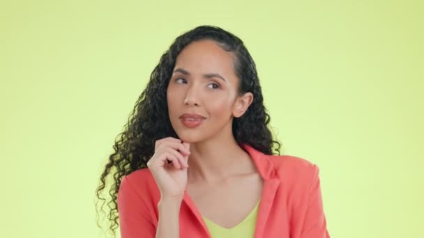 Idea, thinking and solution with biracial woman in studio for decision, brainstorming and answer. Confident, natural and choice with girl isolated on yellow background for considering and question. - Metraje, vídeo