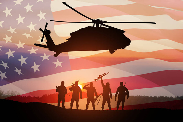 Silhouettes of helicopter and soldiers on background of sunset. Greeting card for Veterans Day, Memorial Day, Air Force Day. USA celebration. - Foto, afbeelding