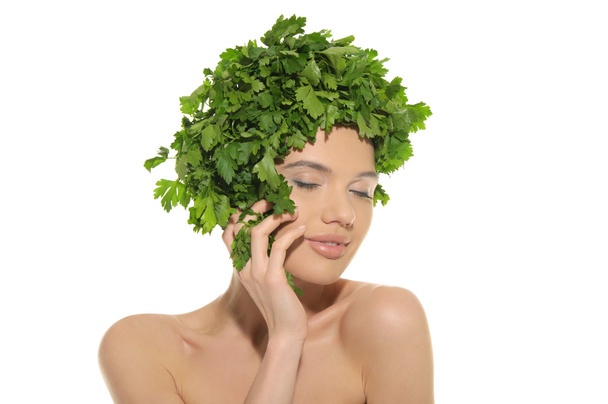 Beautiful woman with hat of parsley - Zdjęcie, obraz