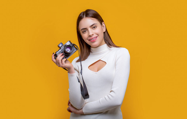 Woman holding camera. photographing girl joy make photography taking concept. Girl using a camera photo. Photographer camera photo, Girl with a cameras. - Photo, Image