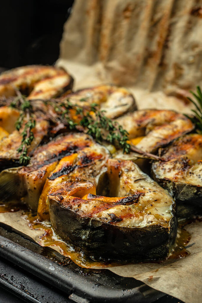 Delicious grilled sturgeon fish steaks. Food recipe background. Close up. - Foto, Imagem