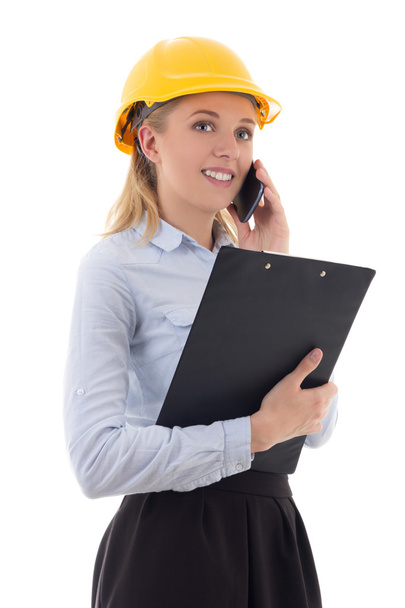 pretty business woman architect in builder helmet talking by pho - Photo, Image