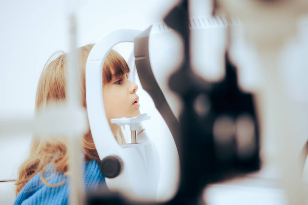 Toddler Girl During Eye Examination with a Slit Lamp Microscope  - Fotoğraf, Görsel