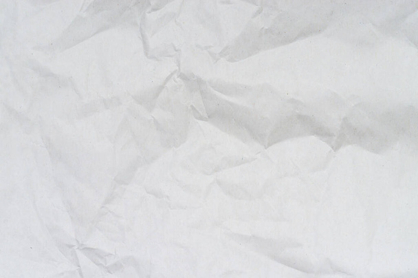 Зморщений або зморщений білий трафаретний папір або тканина використовується для текстури тла
. - Фото, зображення