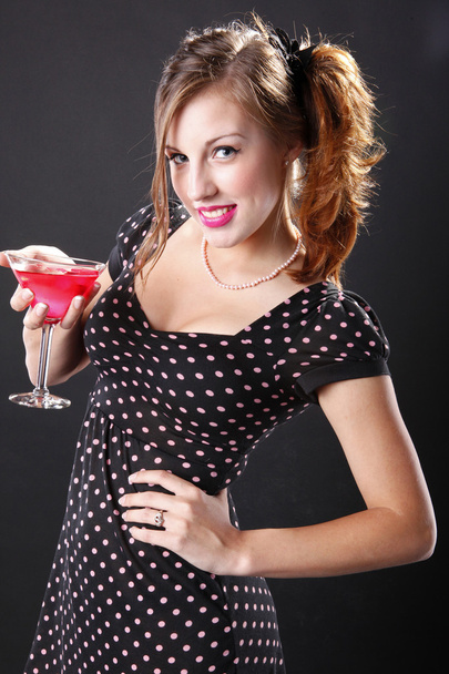 Cute girl with cosmopolitan martini cocktail - Photo, Image