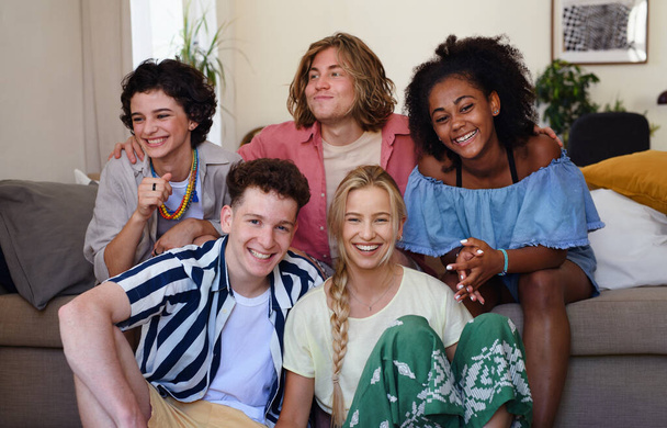 A portrait of diverse group of friends with mixed races having fun together indoors, Friendship and lifestyle concepts - Photo, image