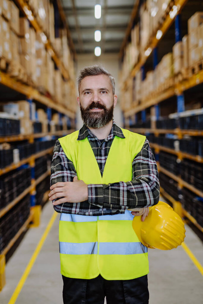 Portrait of a warehouse worker or a supervisor. - Zdjęcie, obraz