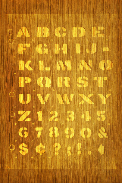 Stenciled alphabet background - Foto, Bild