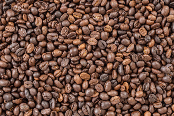 Fresh roasted brown coffee beans background - Фото, зображення