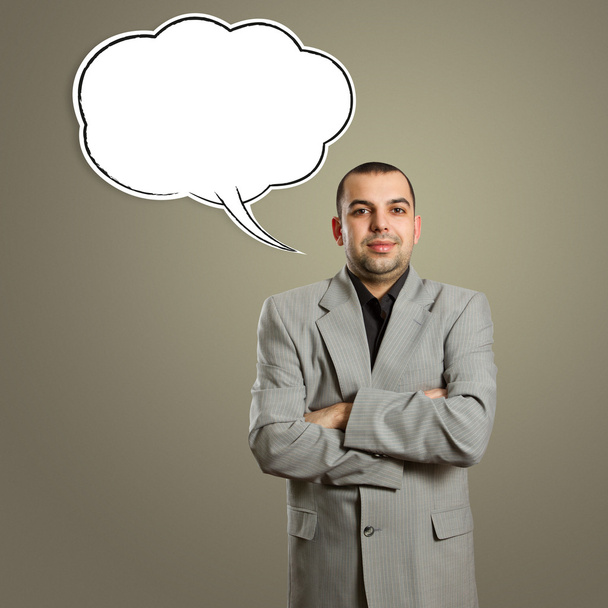 Male in suit with crossed hands and speech bubble - Photo, Image