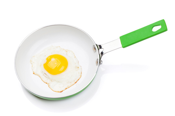 Fried egg in a frying pan - Фото, зображення