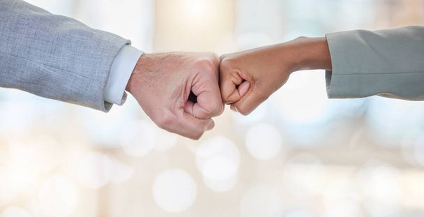 Business people, fist bump and partnership in collaboration for meeting, trust or unity at the office. Team bumping hands for corporate teamwork, success or agreement in deal, greeting or support. - Fotografie, Obrázek