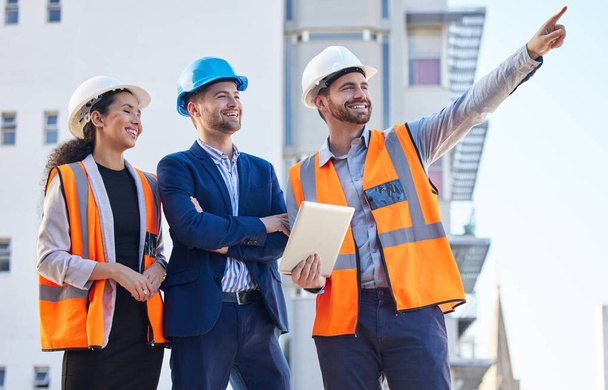 Engineering people pointing for outdoor planning, teamwork or collaboration at building construction site or development. Architecture, property and business contractor or industry person with group. - Foto, imagen