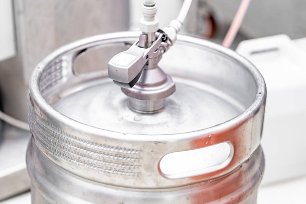 aluminium beer barrel in a brewery. High quality photo - Fotografie, Obrázek