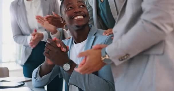 Business people, winner and success applause in office for career goal achievement of black man. Celebration, gratitude and pride of businessman with job promotion support from interracial workers. - Video