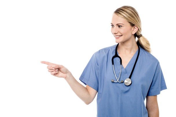 Female doctor pointing something - Foto, Imagem