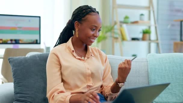 Black woman, laptop or credit card in online shopping, e commerce or retail ecommerce on living room sofa. Smile, happy or relax customer on banking technology for internet payment, fintech or buying. - Footage, Video
