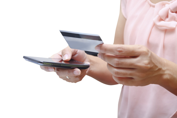 Nainen ostoksilla luottokortilla valkoisella taustalla
 - Valokuva, kuva