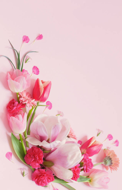 beautiful spring flowers on pink background - Fotó, kép