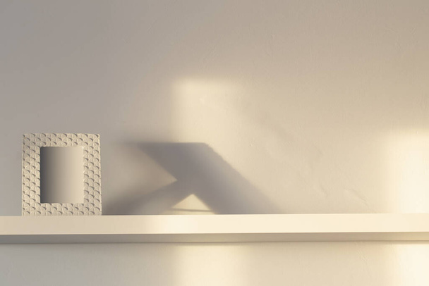 frame on white wooden shelf on white background - Φωτογραφία, εικόνα