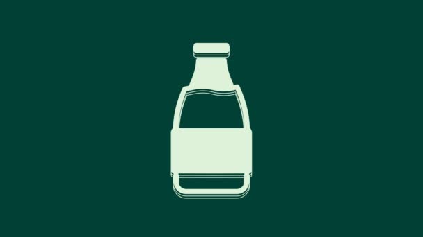 Witte gesloten glazen fles met melk pictogram geïsoleerd op groene achtergrond. 4K Video motion grafische animatie. - Video