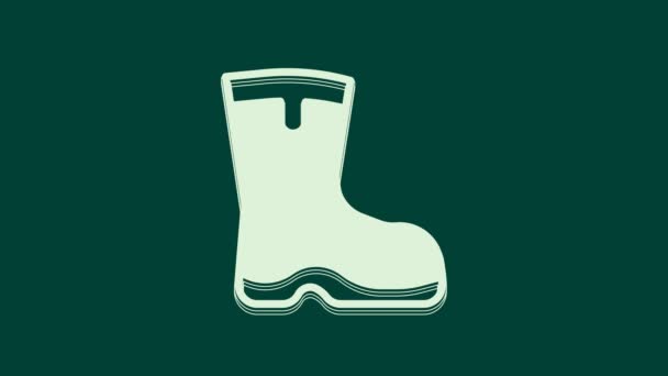 Fehér Horgász csizma ikon elszigetelt zöld alapon. Vízálló gumicsizma. Gumicsizma esős időjáráshoz, horgászathoz, vadászathoz, kertészkedéshez. 4K Videó mozgás grafikus animáció. - Felvétel, videó