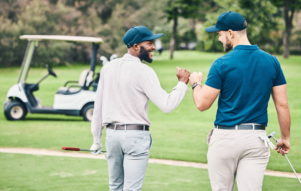 Man, friends and fist bump on golf course for sports, partnership or trust on grass field together. Happy sporty men bumping hands or fists in collaboration for good match, game or competition. - Fotó, kép