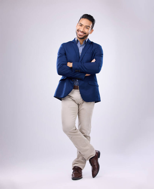 Smile, leader and portrait of business man with confidence, positive mindset and power in studio. Corporate fashion, success mockup and isolated happy male with pride, leadership and professional. - Фото, зображення