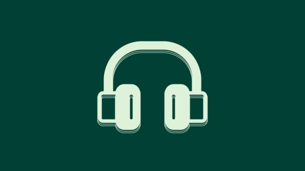 Witte koptelefoon pictogram geïsoleerd op groene achtergrond. Oortelefoons. Concept voor het luisteren naar muziek, service, communicatie en operator. 4K Video motion grafische animatie. - Video