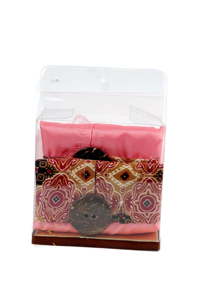 Una guantera de pañuelos de tela batik estampada
 - Foto, imagen